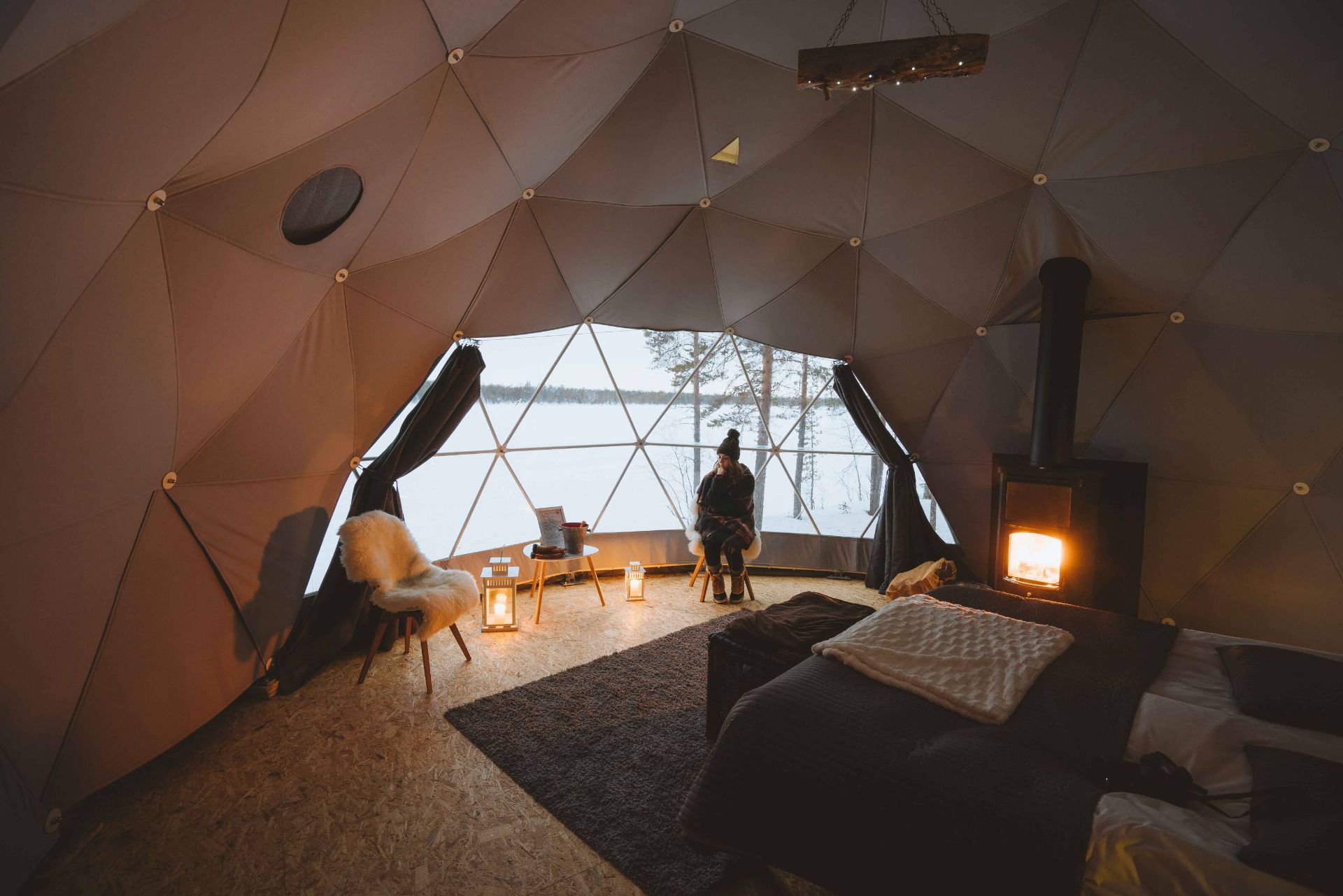 Aurora above an accommodation dome in Lapland