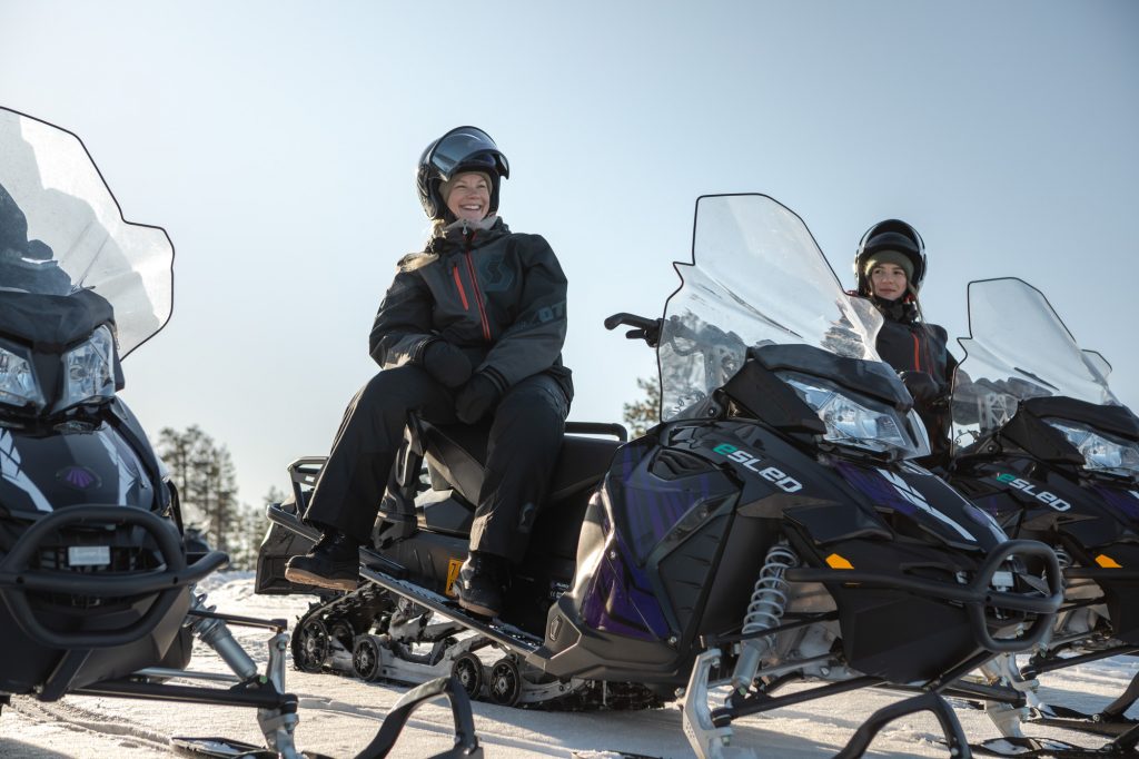 Guests on snowmobiles on a clear winter day, Pyhä, Finnish Lapland