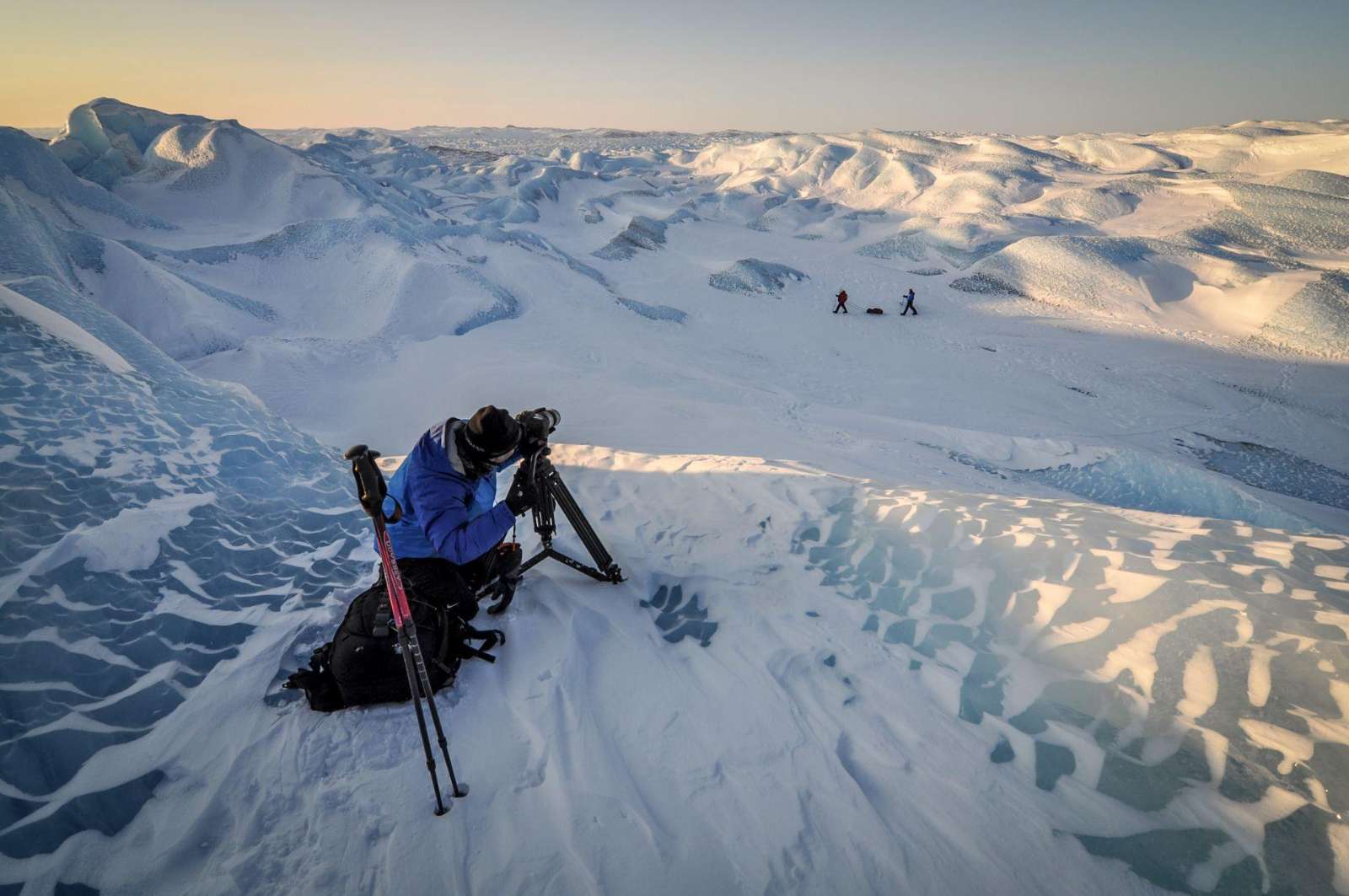 A photographer at the Greenland ice sheet