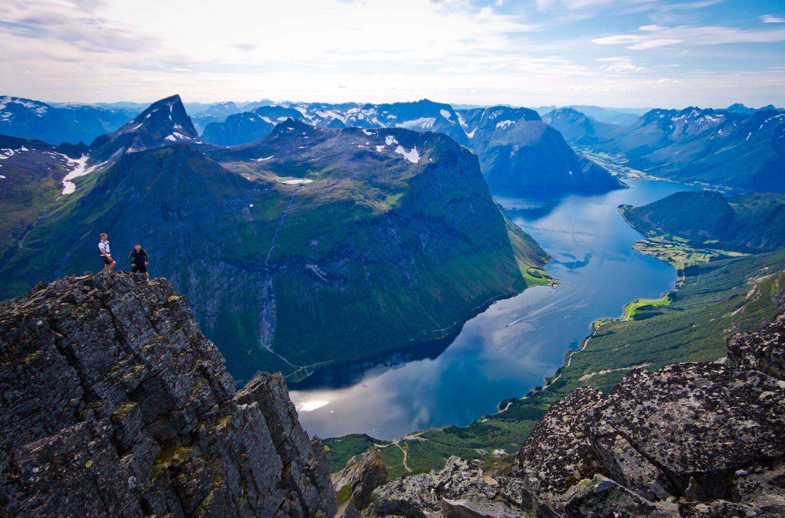 Hiker on Slogen above the Hjørundfjord, Norway