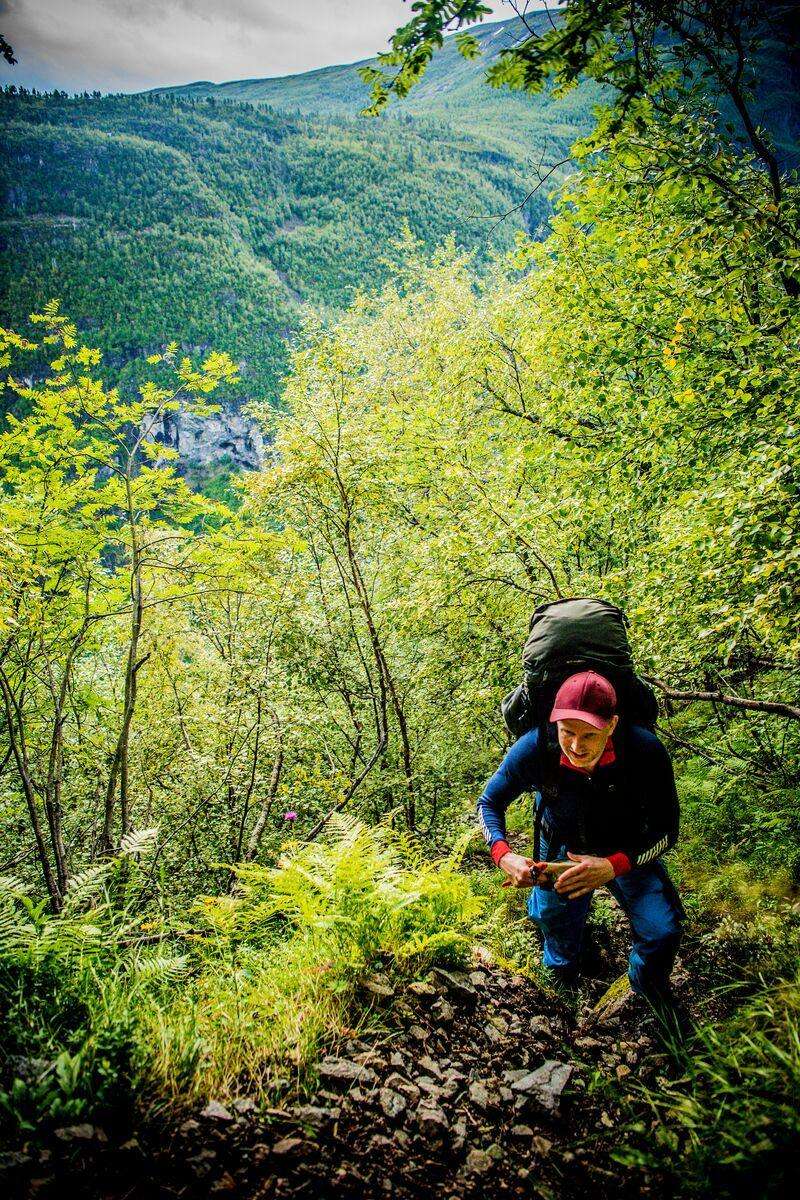 Hiker in the Utladalen valley, Jotunheimen, Norway